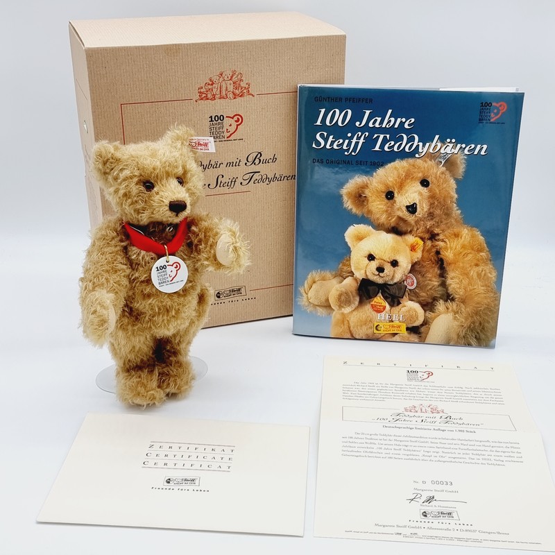 Steiff Teddybär mit Buch "100 Jahre Steiff Teddybären"